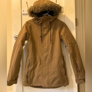 This is a women’s xs coffee brown Volcom snow coat.